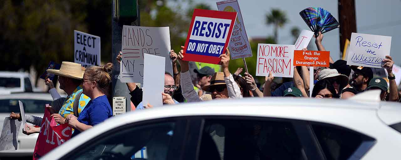 Proteters holding signs